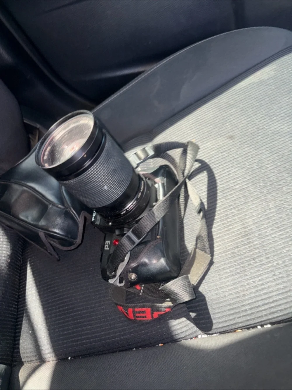 Pentax Black SLR Camera with Telephoto Lens